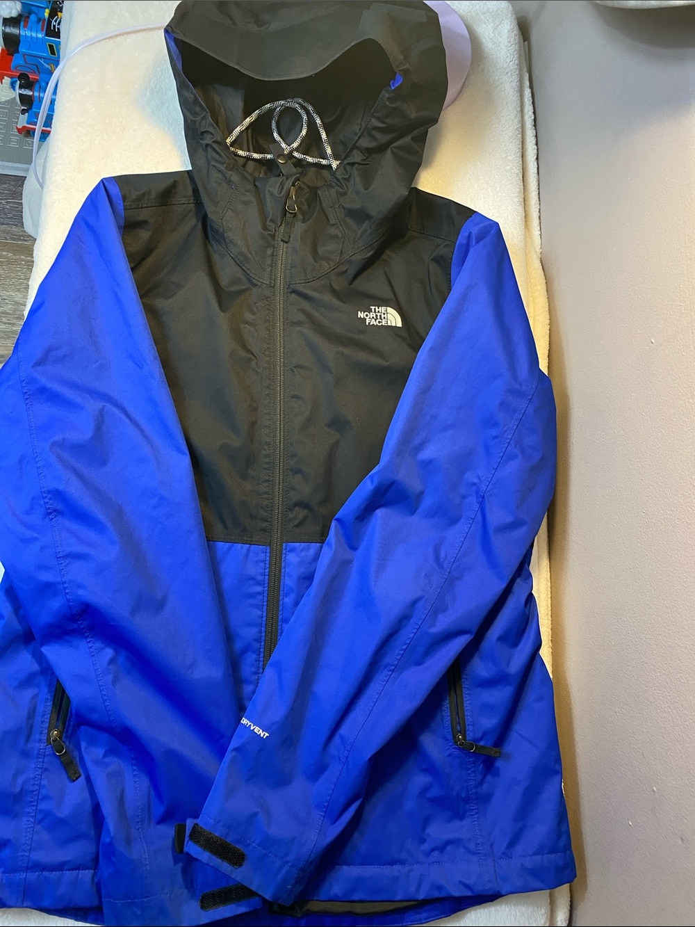 The North Face Blue and Black Men’s Hooded Rain Jacket